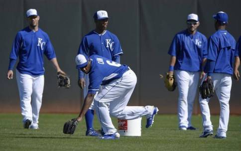 Lorenzo Cain fielded grounders during Wednesday's Royals spring training on February 21, 2015, in Surprise, Ariz. Photo Credit: John Sleezer - The Kansas City Star
